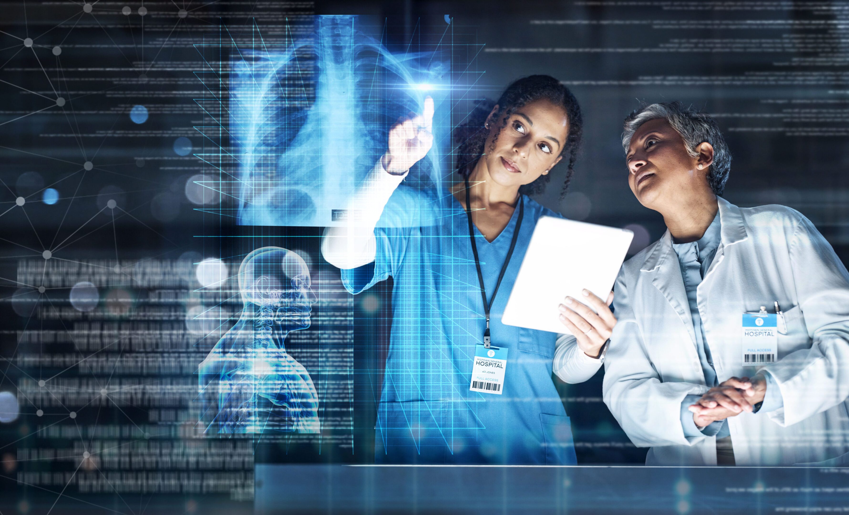 Doctors analyzing digital medical data together.