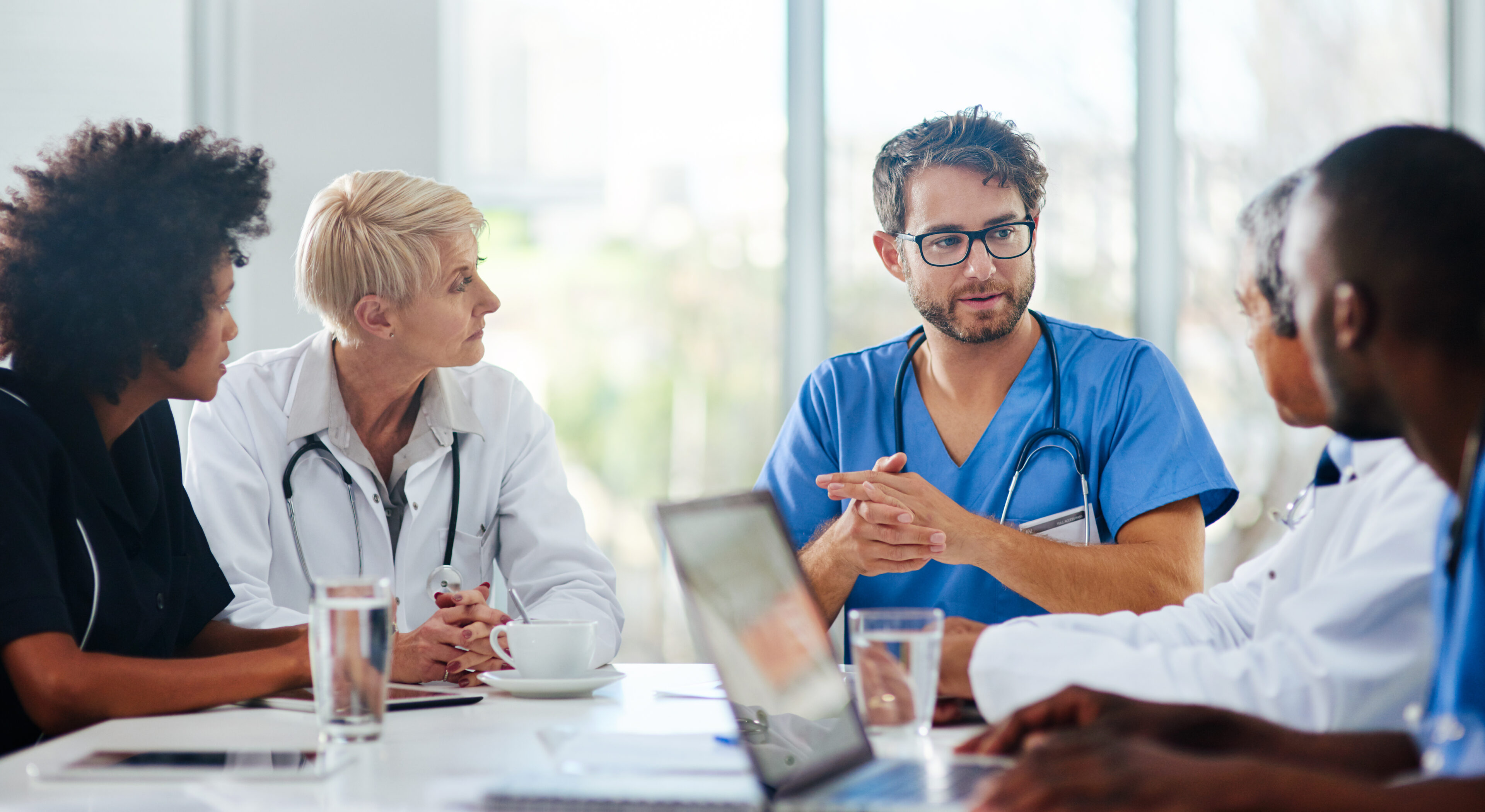 Doctors having a meeting in a conference room.